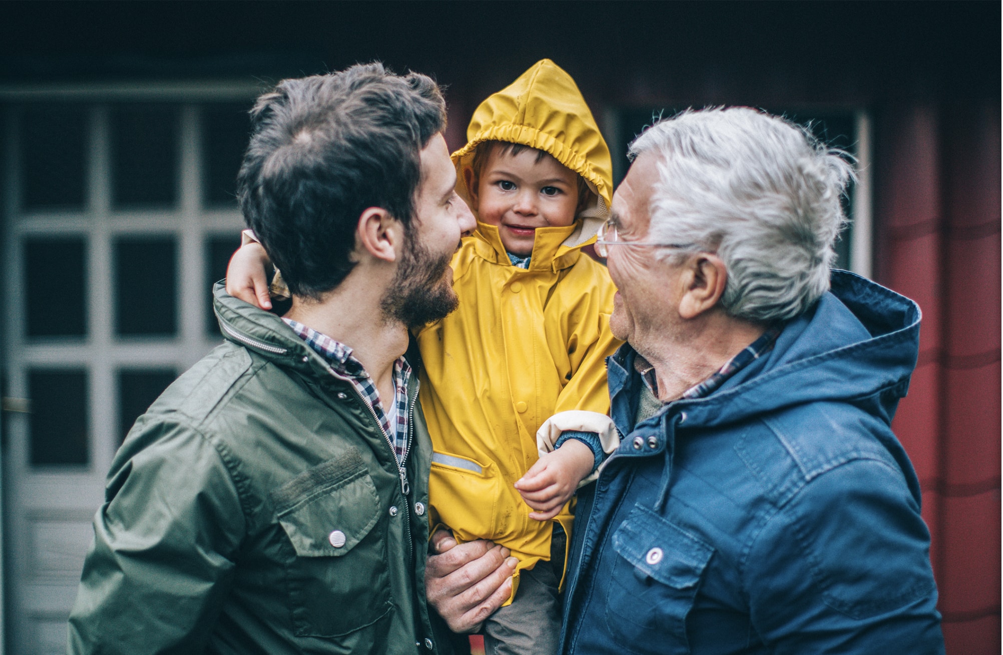 four happy people in a meeting